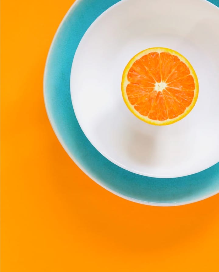 cut orange on a plate