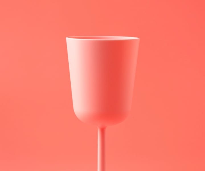 picture of an cup with a pink background